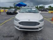✅ 2017 Ford Fusion Hybrid Titanium • VIN: 3FA6P0RU4HR250242 • Лот: 43224550. Опубликован ранее на IAAI с пробегом 178 522 миль. Бесплатный доступ к архиву аукционных продаж из США и подробный отчёт об истории автомобиля на DreamBid. Изображение 12.
