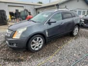 ✅ 2012 Cadillac SRX Performance Collection • VIN: 3GYFNBE30CS598950 • Lot: 81205505. Listed on Copart with 96,413 mi. Free auction sales archive from the USA and detailed vehicle history report at DreamBid. Image 1.
