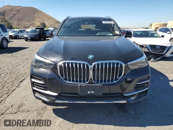 ✅ 2023 BMW X5 xDrive45e • VIN: 5UXTA6C03P9N92460 • Лот: 87025515. Опубликован ранее на Copart с пробегом 65 068 миль. Бесплатный доступ к архиву аукционных продаж из США и подробный отчёт об истории автомобиля на DreamBid. Изображение 5.