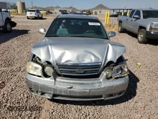 ✅ 2005 Kia Optima LX • VIN: KNAGD126255414222 • Lot: 72723534. Wystawiony na Copart z przebiegiem 148 269 mil. Bezpłatny archiwum sprzedaży aukcyjnych z USA i szczegółowy raport historii pojazdu na DreamBid. Zdjęcie 5.