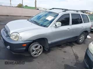 2002 Hyundai Santa Fe GLS z VIN KM8SC13D62U322962, wystawiony jako IAAI lot #41437333 z przebiegiem 183 711 mil mil oraz . Historia ofert i sprzedaży dostępna na DreamBid. Obrazek 6.