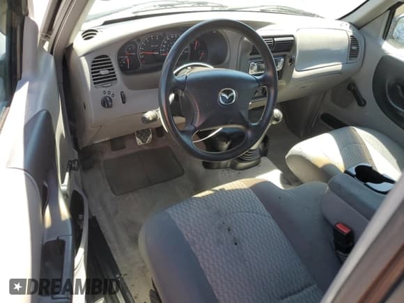 ✅ 2003 Mazda B-Series SE • VIN: 4F4YR16D13TM05738 • Lot: 67868945. Listed on Copart with 90,377 mi. Free auction sales archive from the USA and detailed vehicle history report at DreamBid. Image 8.
