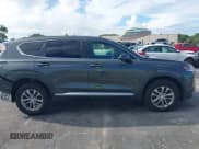 ✅ 2019 Hyundai Santa Fe SE • VIN: 5NMS23AD1KH044131 • Lot: 43237640. Wystawiony na IAAI z przebiegiem 105 619 mil. Bezpłatny archiwum sprzedaży aukcyjnych z USA i szczegółowy raport historii pojazdu na DreamBid. Zdjęcie 14.