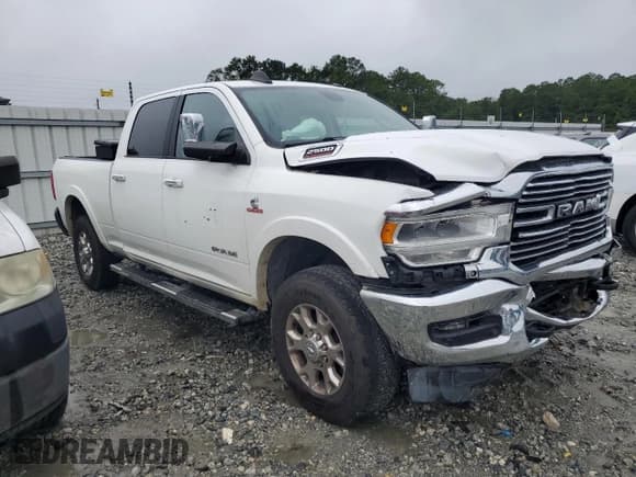 ✅ 2020 Ram 2500 Laramie • VIN: 3C6UR5FL8LG110937 • Лот: 67425175. Опубликован ранее на Copart с пробегом 128 666 миль. Бесплатный доступ к архиву аукционных продаж из США и подробный отчёт об истории автомобиля на DreamBid. Изображение 4.