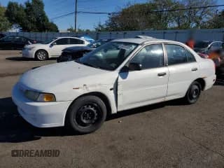 ✅ 2001 Mitsubishi Mirage ES • VIN: JA3AY26C21U013335 • Lot: 85375355. Listed on Copart with 202,409 mi. Free auction sales archive from the USA and detailed vehicle history report at DreamBid. Image 1.