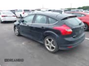 ✅ 2014 Ford Focus Titanium • VIN: 1FADP3N27EL114825 • Lot: 43217005. Listed on IAAI with 148,002 mi. Free auction sales archive from the USA and detailed vehicle history report at DreamBid. Image 3.