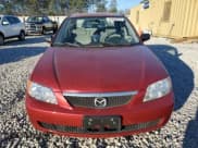 ✅ 2001 Mazda Protege DX • VIN: JM1BJ222610438233 • Lot: 41649375. Listed on Copart with 226,394 mi. Free auction sales archive from the USA and detailed vehicle history report at DreamBid. Image 5.