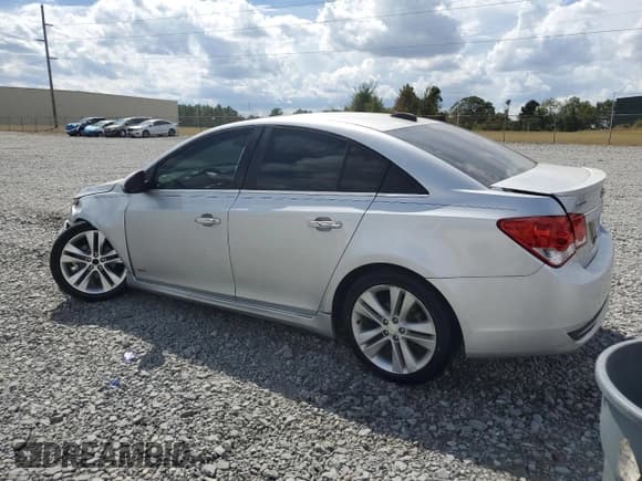 ✅ 2015 Chevrolet Cruze LTZ • VIN: 1G1PG5SB4F7183935 • Lot: 84209825. Listed on Copart with 132,199 mi. Free auction sales archive from the USA and detailed vehicle history report at DreamBid. Image 2.