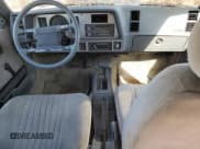 ✅ 1988 Pontiac Sunbird • VIN: 1G2JD51KXJ7501836 • Lot: 52988185. Listed on Copart with 73,848 mi. Free auction sales archive from the USA and detailed vehicle history report at DreamBid. Image 8.