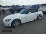 ✅ 2000 Honda S2000 • VIN: JHMAP1145YT006943 • Lot: 64041525. Listed on Copart with 59,281 mi. Free auction sales archive from the USA and detailed vehicle history report at DreamBid. Image 1.