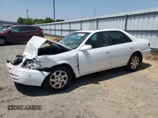 ✅ 1997 Toyota Camry LE • VIN: JT2BF22K5V0027518 • Lot: 64042195. Wystawiony na Copart z przebiegiem 120 074 mil. Bezpłatny archiwum sprzedaży aukcyjnych z USA i szczegółowy raport historii pojazdu na DreamBid. Zdjęcie 1.