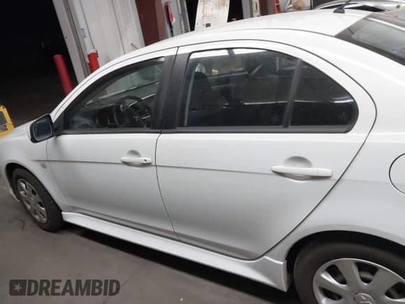 ✅ 2014 Mitsubishi Lancer ES • VIN: JA32U2FU2EU019862 • Lot: 42496155. Listed on IAAI with 128,126 mi. Free auction sales archive from the USA and detailed vehicle history report at DreamBid. Image 14.