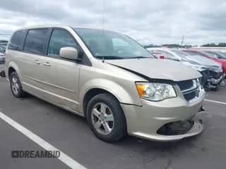 2012 Dodge Grand Caravan SXT z VIN 2C4RDGCG1CR399332, wystawiony jako IAAI lot #43444930 z przebiegiem 151 325 mil mil oraz . Historia ofert i sprzedaży dostępna na DreamBid. Obrazek 1.