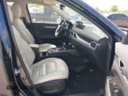 ✅ 2023 Mazda CX-5 S Carbon Edition • VIN: JM3KFBCM6P0165036 • Lot: 42622732. Listed on IAAI with 44,497 mi. Free auction sales archive from the USA and detailed vehicle history report at DreamBid. Image 5.