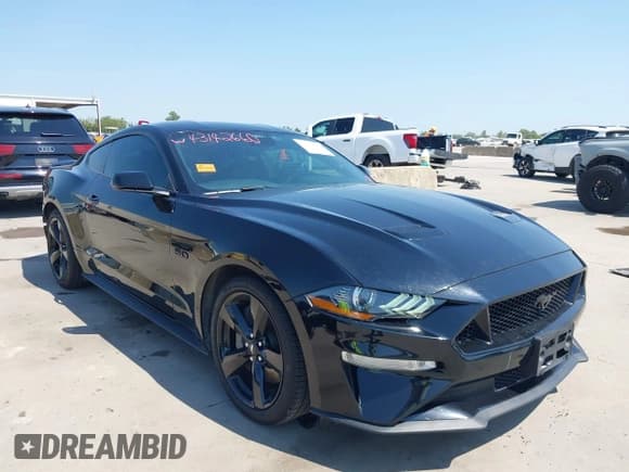 ✅ 2022 Ford Mustang GT • VIN: 1FA6P8CFXN5134440 • Lot: 43142660. Listed on IAAI with 44,087 mi. Free auction sales archive from the USA and detailed vehicle history report at DreamBid. Image 1.