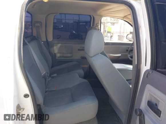 ✅ 2005 Dodge Dakota ST • VIN: 1D7HE28N45S218668 • Lot: 42276061. Wystawiony na IAAI z przebiegiem 141 724 mil. Bezpłatny archiwum sprzedaży aukcyjnych z USA i szczegółowy raport historii pojazdu na DreamBid. Zdjęcie 8.