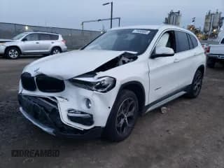 ✅ 2018 BMW X1 sDrive28i • VIN: WBXHU7C35J5H43995 • Lot: 71650602. Listed on Copart with 80,437 mi. Free auction sales archive from the USA and detailed vehicle history report at DreamBid. Image 1.
