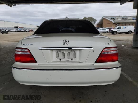 ✅ 2004 Acura RL w/Navigation System • VIN: JH4KA96674C002305 • Lot: 82403615. Wystawiony na Copart z przebiegiem 241 658 mil. Bezpłatny archiwum sprzedaży aukcyjnych z USA i szczegółowy raport historii pojazdu na DreamBid. Zdjęcie 6.