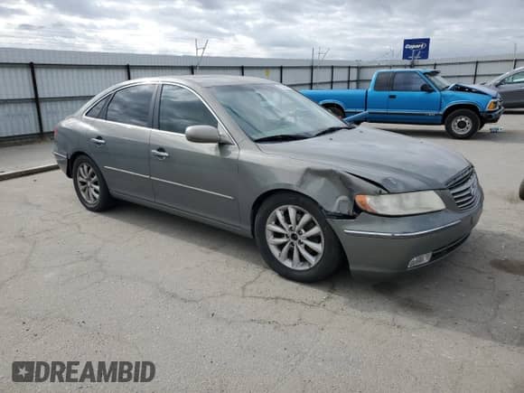 2006 Hyundai Azera SE с VIN KMHFC46F76A054625, выставлен на аукционе Copart как лот 56588315 с пробегом 178 667 миль миль и Списание • Salvage title. История ставок и продаж доступна на DreamBid. Изображение 4.