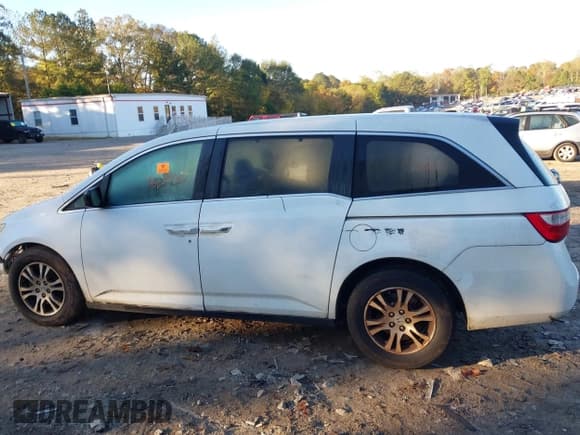 ✅ 2012 Honda Odyssey EX-L • VIN: 5FNRL5H6XCB013803 • Lot: 43586873. Listed on IAAI with 223,098 mi. Free auction sales archive from the USA and detailed vehicle history report at DreamBid. Image 14.