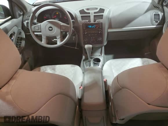 2005 Chevrolet Malibu LS z VIN 1G1ZT54865F337569, wystawiony jako Copart lot #82240424 z przebiegiem 74 919 mil mil oraz Czysty tytuł • Clean title. Historia ofert i sprzedaży dostępna na DreamBid. Obrazek 8.