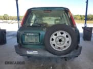 ✅ 1999 Honda CR-V LX • VIN: JHLRD2848XC024802 • Lot: 85060525. Listed on Copart with 194,834 mi. Free auction sales archive from the USA and detailed vehicle history report at DreamBid. Image 6.