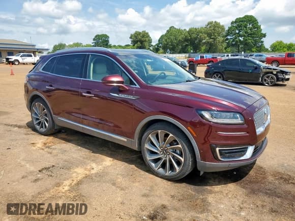 ✅ 2019 Lincoln Nautilus Reserve • VIN: 2LMPJ6LP7KBL61802 • Lot: 64099465. Listed on Copart with 57,222 mi. Free auction sales archive from the USA and detailed vehicle history report at DreamBid. Image 4.