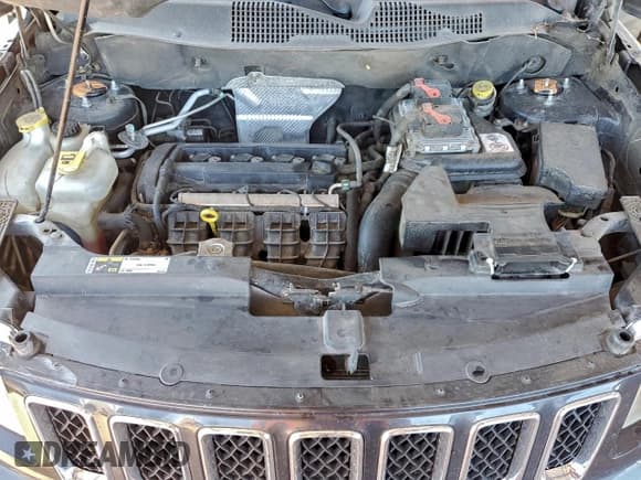 ✅ 2014 Jeep Compass Sport • VIN: 1C4NJCBAXED725910 • Lot: 93786035. Listed on Copart with 107,972 mi. Free auction sales archive from the USA and detailed vehicle history report at DreamBid. Image 12.