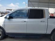 ✅ 2023 Honda Ridgeline RTL-E • VIN: 5FPYK3F72PB035287 • Lot: 43234228. Listed on IAAI with 15,634 mi. Free auction sales archive from the USA and detailed vehicle history report at DreamBid. Image 14.