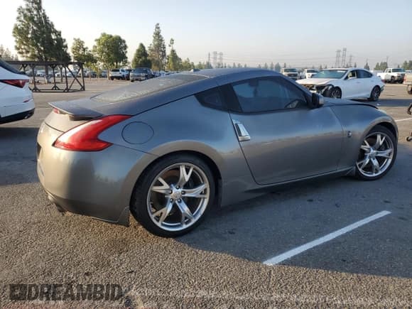 ✅ 2012 Nissan 370Z Touring • VIN: JN1AZ4EH4CM564945 • Лот: 80564105. Опубликован ранее на Copart с пробегом 134 180 миль. Бесплатный доступ к архиву аукционных продаж из США и подробный отчёт об истории автомобиля на DreamBid. Изображение 3.