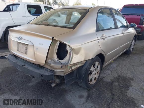 ✅ 2004 Kia Spectra LX • VIN: KNAFE122145041484 • Лот: 42268777. Опубликован ранее на IAAI с пробегом 102 020 миль. Бесплатный доступ к архиву аукционных продаж из США и подробный отчёт об истории автомобиля на DreamBid. Изображение 4.