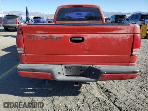 ✅ 1999 Dodge Dakota SLT • VIN: 1B7GL22Y2XS193321 • Lot: 50845475. Wystawiony na Copart z przebiegiem 249 030 mil. Bezpłatny archiwum sprzedaży aukcyjnych z USA i szczegółowy raport historii pojazdu na DreamBid. Zdjęcie 6.