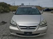 ✅ 2006 Honda Odyssey EX-L • VIN: 5FNRL38656B410666 • Лот: 80554015. Опубликован ранее на Copart с пробегом 243 001 миль. Бесплатный доступ к архиву аукционных продаж из США и подробный отчёт об истории автомобиля на DreamBid. Изображение 5.