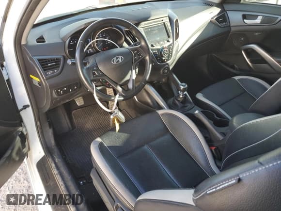 ✅ 2014 Hyundai Veloster Turbo • VIN: KMHTC6AE2EU197623 • Lot: 80214114. Wystawiony na Copart z przebiegiem 18 466 mil. Bezpłatny archiwum sprzedaży aukcyjnych z USA i szczegółowy raport historii pojazdu na DreamBid. Zdjęcie 8.