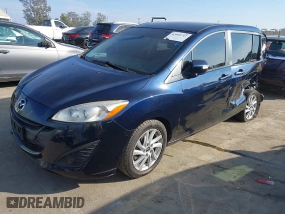 ✅ 2015 Mazda 5 Sport • VIN: JM1CW2BL7F0182965 • Lot: 43606712. Listed on IAAI with 150,777 mi. Free auction sales archive from the USA and detailed vehicle history report at DreamBid. Image 2.