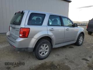 ✅ 2010 Mazda Tribute Sport • VIN: 4F2CY0C77AKM02764 • Лот: 75112623. Опубликован ранее на Copart с пробегом 147 590 миль. Бесплатный доступ к архиву аукционных продаж из США и подробный отчёт об истории автомобиля на DreamBid. Изображение 3.