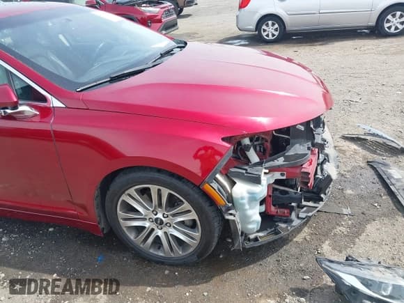 ✅ 2015 Lincoln MKZ • VIN: 3LN6L2GK5FR618150 • Лот: 41898829. Опубликован ранее на IAAI с пробегом 135 643 миль. Бесплатный доступ к архиву аукционных продаж из США и подробный отчёт об истории автомобиля на DreamBid. Изображение 18.