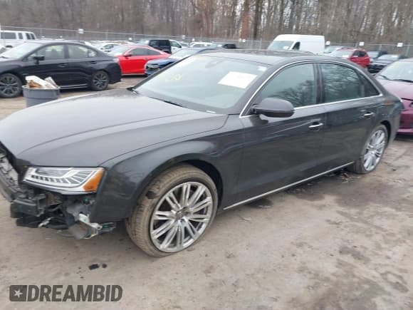 ✅ 2016 Audi A8 3.0T • VIN: WAU34AFD7GN008348 • Lot: 41352817. Listed on IAAI with 105,762 mi. Free auction sales archive from the USA and detailed vehicle history report at DreamBid. Image 2.