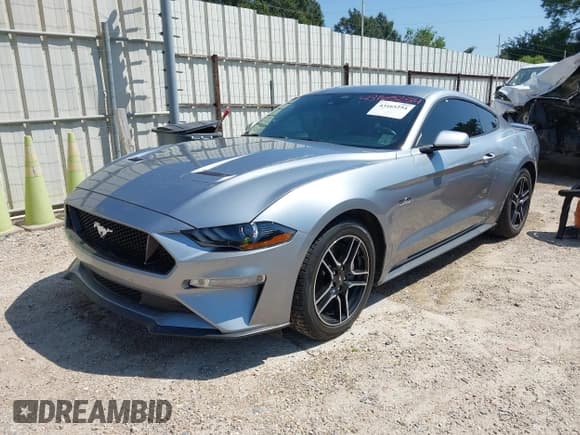 ✅ 2021 Ford Mustang GT • VIN: 1FA6P8CF6M5156594 • Lot: 43165254. Listed on IAAI with 43,467 mi. Free auction sales archive from the USA and detailed vehicle history report at DreamBid. Image 2.