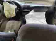 1999 Saturn SL z VIN 1G8ZF5281XZ273180, wystawiony jako Copart lot #86843915 z przebiegiem Nie podano mil oraz Szkoda całkowita • Salvage title. Historia ofert i sprzedaży dostępna na DreamBid. Obrazek 8.