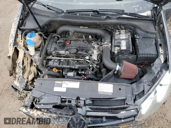 ✅ 2012 Volkswagen Golf R w/Sunroof & Navi • VIN: WVWPF7AJ4CW206341 • Лот: 47997585. Опубликован ранее на Copart с пробегом 114 054 миль. Бесплатный доступ к архиву аукционных продаж из США и подробный отчёт об истории автомобиля на DreamBid. Изображение 11.