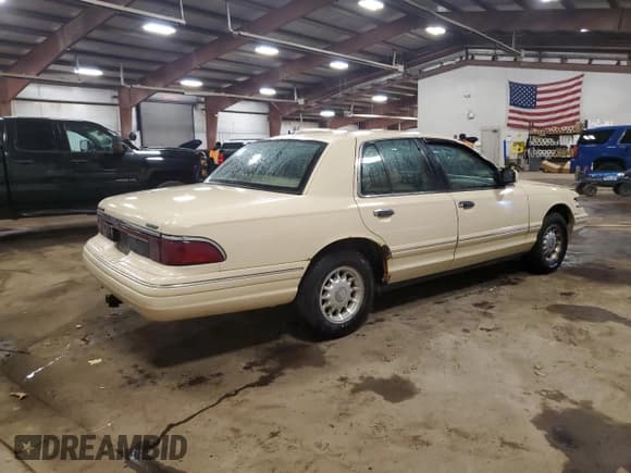 ✅ 1997 Mercury Grand Marquis LS • VIN: 2MELM75W1VX605577 • Lot: 92495445. Listed on Copart with 143,233 mi. Free auction sales archive from the USA and detailed vehicle history report at DreamBid. Image 3.