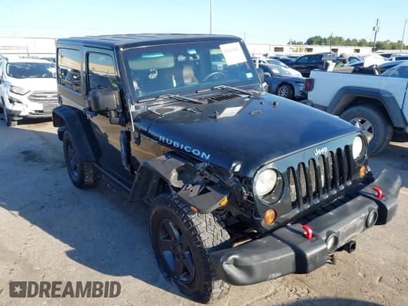 ✅ 2011 Jeep Wrangler Rubicon • VIN: 1J4HA6D18BL550788 • Лот: 43415447. Опубликован ранее на IAAI с пробегом 117 449 миль. Бесплатный доступ к архиву аукционных продаж из США и подробный отчёт об истории автомобиля на DreamBid. Изображение 1.