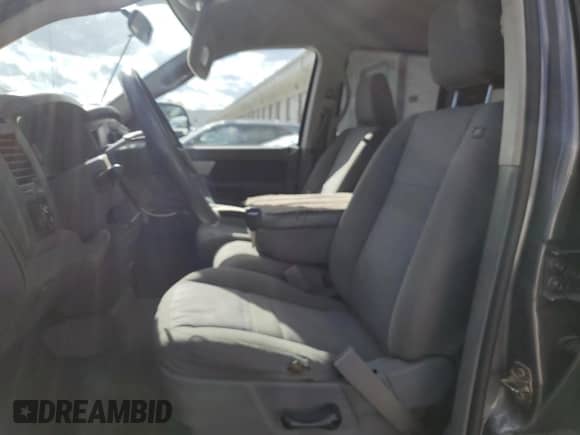 2007 Dodge 1500 SLT z VIN 1D7HU18257S135949, wystawiony jako Copart lot #87294805 z przebiegiem 168 407 mil mil oraz Czysty tytuł • Clean title. Historia ofert i sprzedaży dostępna na DreamBid. Obrazek 7.