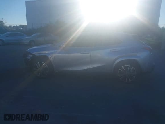 ✅ 2023 Lexus UX 250h Premium • VIN: JTHP6JBH7P2148102 • Lot: 43488041. Wystawiony na IAAI z przebiegiem 21 340 mil. Bezpłatny archiwum sprzedaży aukcyjnych z USA i szczegółowy raport historii pojazdu na DreamBid. Zdjęcie 15.