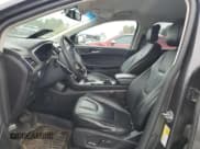 ✅ 2015 Ford Edge Titanium • VIN: 2FMTK4K90FBB23052 • Lot: 84875295. Wystawiony na Copart z przebiegiem 204 842 mil. Bezpłatny archiwum sprzedaży aukcyjnych z USA i szczegółowy raport historii pojazdu na DreamBid. Zdjęcie 7.