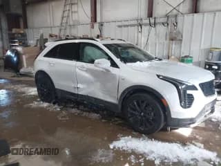 ✅ 2023 Cadillac XT4 AWD Sport • VIN: 1GYFZFR42PF111269 • Лот: 41614455. Опубликован ранее на IAAI с пробегом 21 866 миль. Бесплатный доступ к архиву аукционных продаж из США и подробный отчёт об истории автомобиля на DreamBid. Изображение 1.