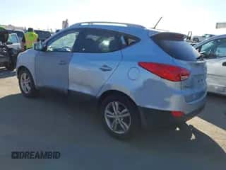 2012 Hyundai Tucson GLS with VIN KM8JU3AC7CU337986, listed as a IAAI auction lot 43412852 with 156,378 mi miles and . Bid and sale history available at DreamBid. Image 3.