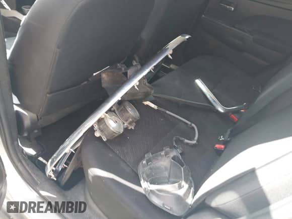 2013 Mitsubishi Outlander SE with VIN 4A4AR4AU3DE002006, listed as a IAAI auction lot 43009482 with 212,901 mi miles and . Bid and sale history available at DreamBid. Image 12.