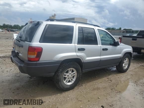 ✅ 2004 Jeep Grand Cherokee Laredo • VIN: 1J4GW48S64C140353 • Lot: 59335125. Listed on Copart with 131,847 mi. Free auction sales archive from the USA and detailed vehicle history report at DreamBid. Image 3.